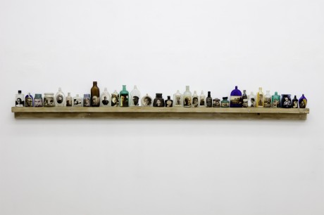 Self Portrait, mixed media, perfue bottles, medicine bottles, portraits of the artist, 2000's